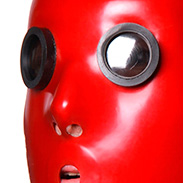 Eyes are small, round, mirrored (eye frames are black)